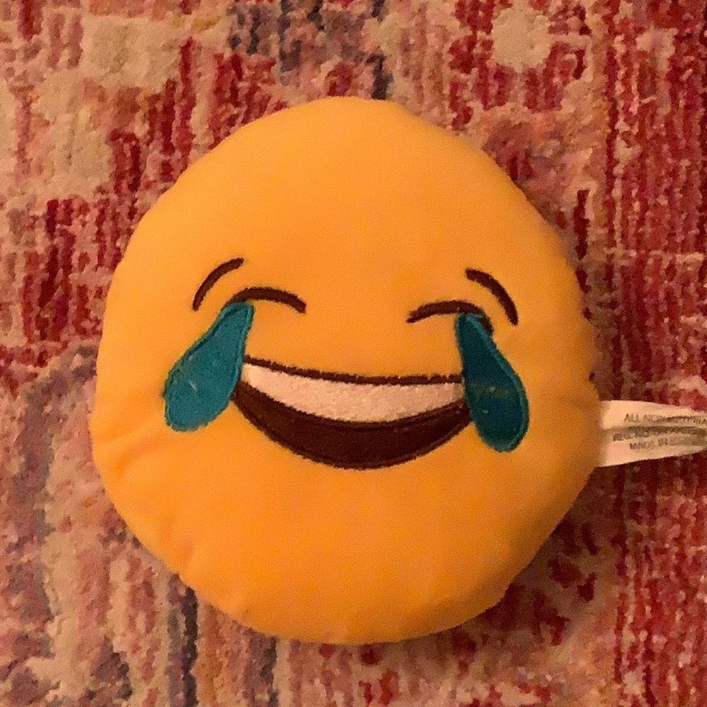 Stuffed laughing emoji